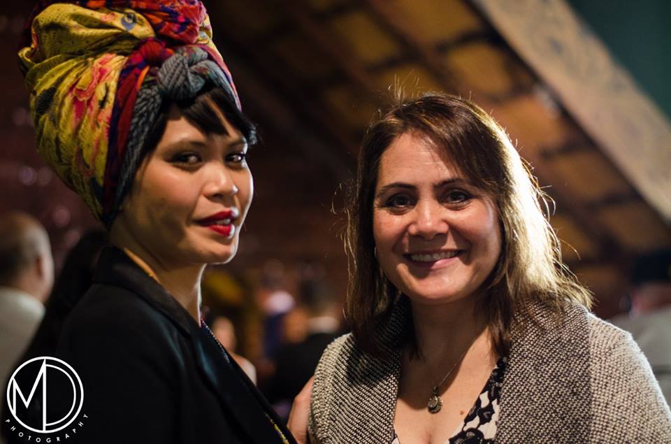 Image depicting Chicago Filipino American artists Trisha Oralie Martin and Elia Boughner at the community celebration event unveiling the Art and Anthropology Art Exhibit. Selected for use on the homepage of the Philippine Heritage Collections interactive web portal. (c) Field Museum of Natural History - CC BY-NC 4.0