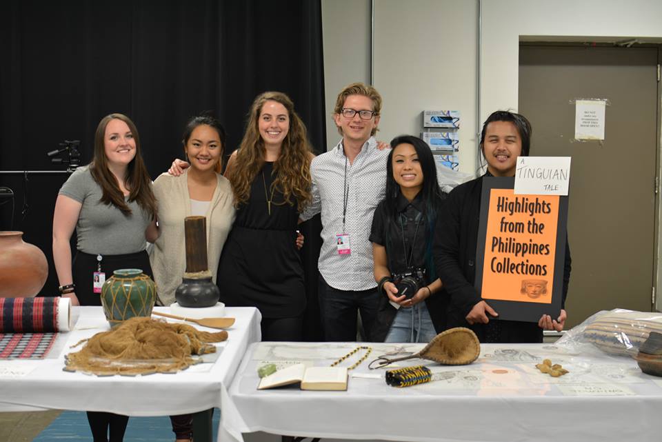 Image depicting members of the Digital Co-Curation Team presenting a table of collections at Members' Night 2015. Selected for use on the homepage of the Philippine Heritage Collections interactive web portal. (c) Field Museum of Natural History - CC BY-NC 4.0