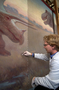 Peter Schoenmann. Progress of Charles Knight murals restoration work, being performed on T.rex and Triceratops mural, in Hall 34, by contractors from PARMA Conservation of Chicago. Shots began 01/13/2005 continued on 01/14/2005