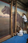 Elizabeth Kendall (owner), Maho Yoshikawa and John Salhus. Progress of Charles Knight murals restoration work, being performed on T.rex and Triceratops mural, in Hall 34, by contractors from PARMA Conservation of Chicago. Shots began 01/13/2005 continued on 01/14/2005