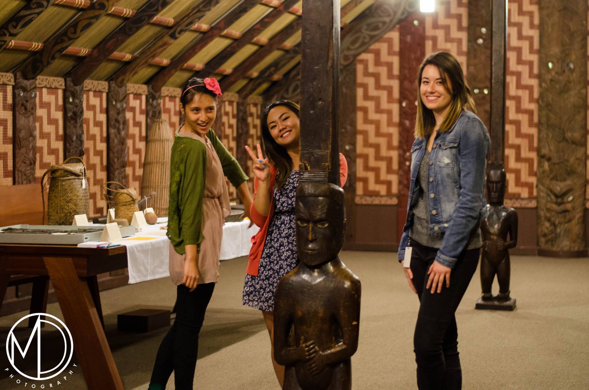 Volunteers within the Marae House. (c) Field Museum of Natural History - CC BY-NC 4.0