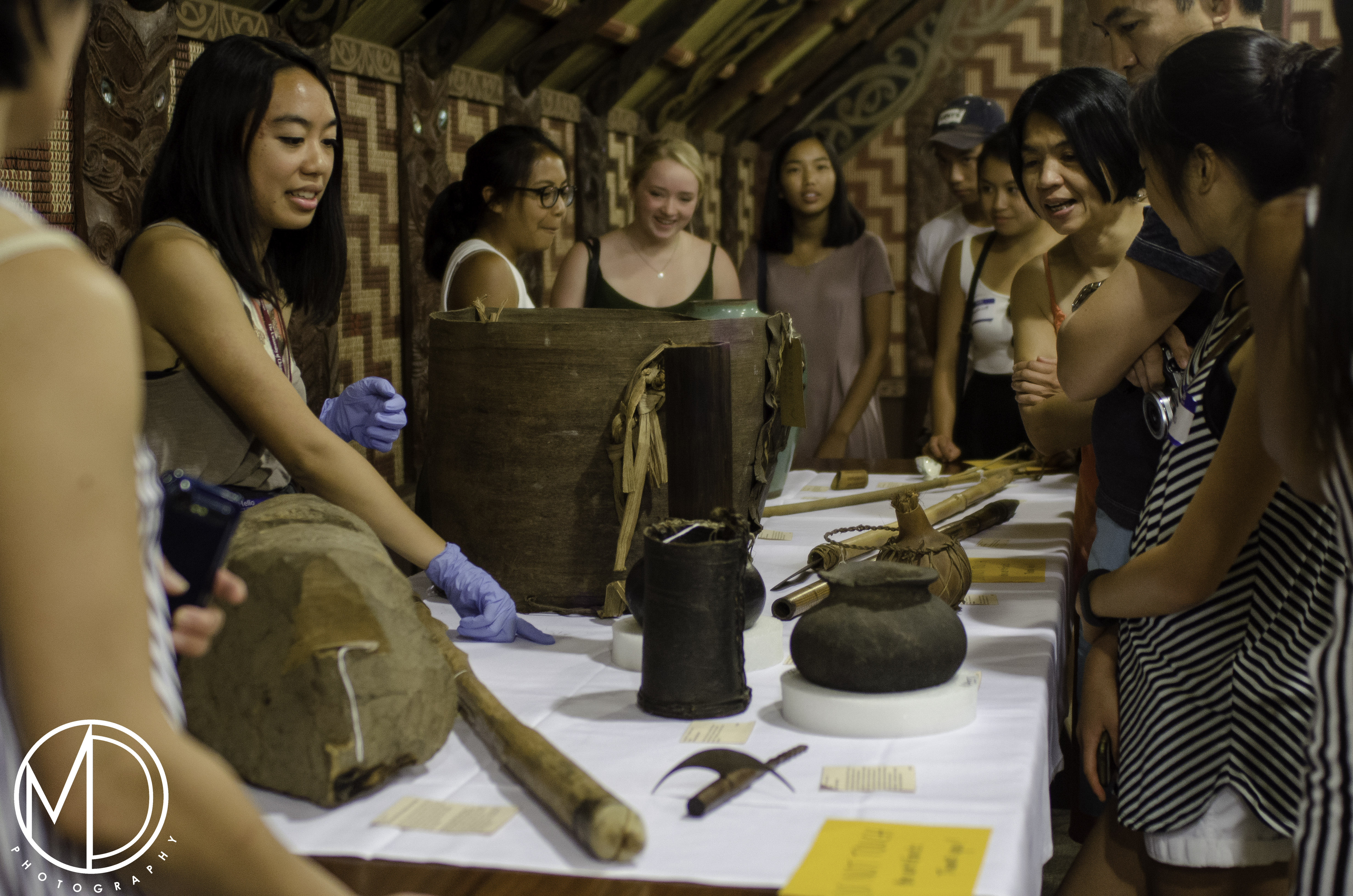 Interns Stephanie Jamilla and Florence Almeda staff an object table during our Pamamang Pinoy event about the cultural significance of rice. (c) Field Museum of Natural History - CC BY-NC 4.0