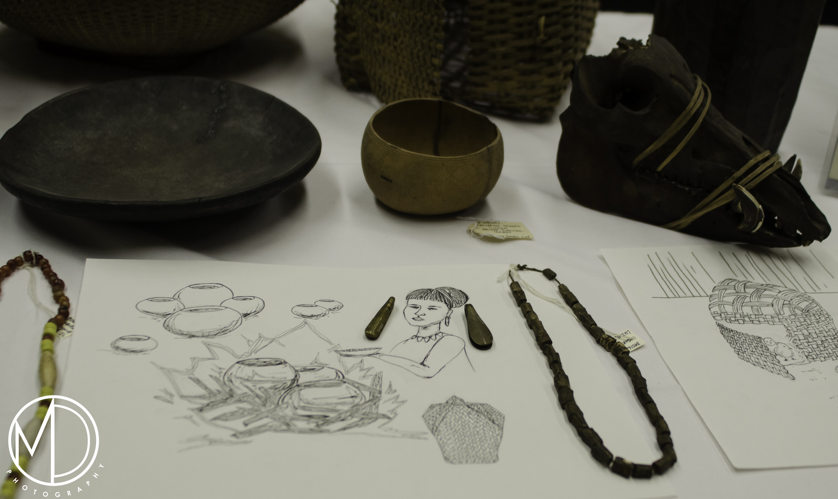 Close up of objects and drawings prepared for the presentation of the Philippines Collection and the traditional Igorot folktale of Lumawig on Earth. (c) Field Museum of Natural History - CC BY-NC 4.0
