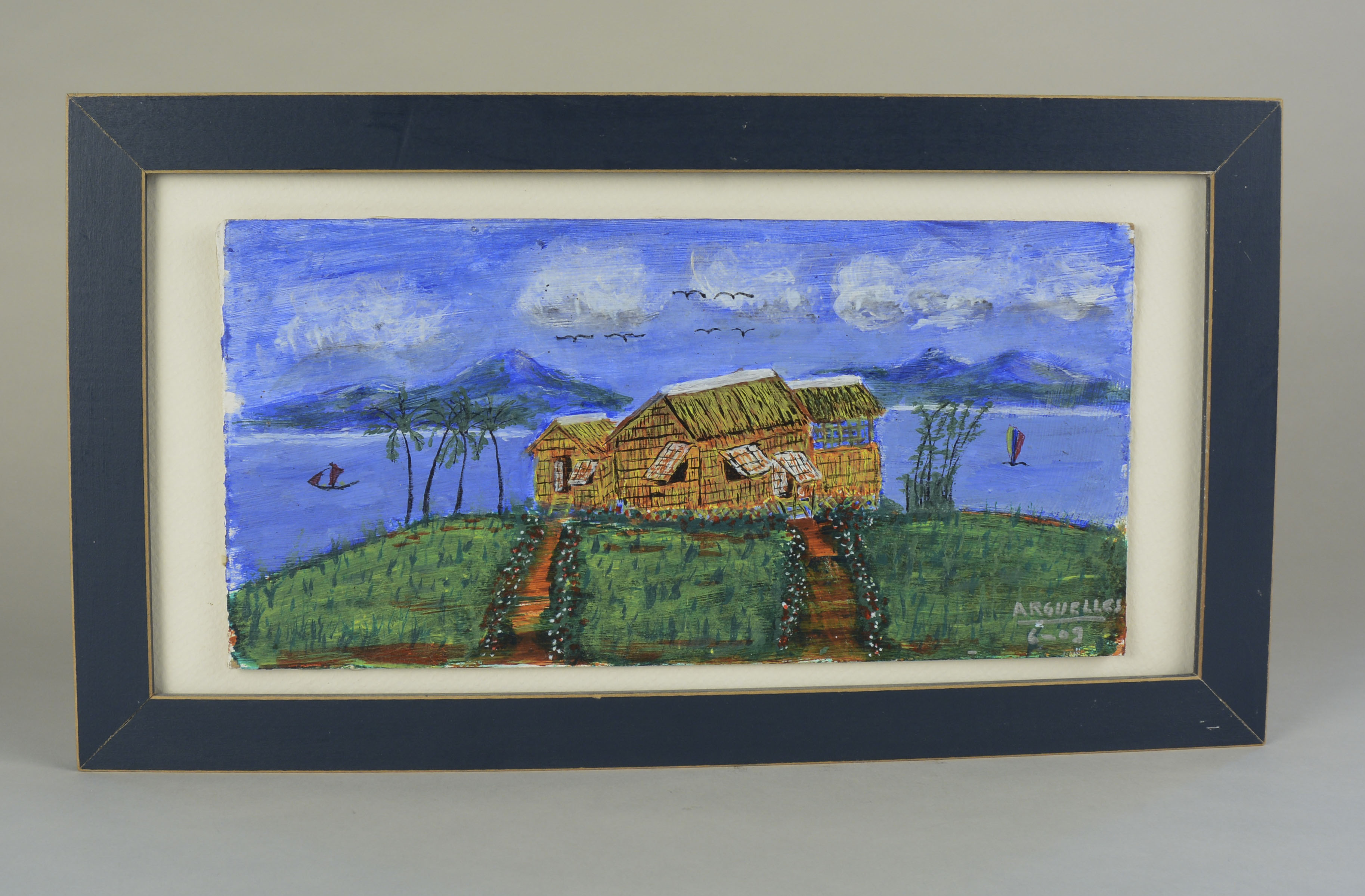 Painting owned by Magdalena Arguelles.The painting was made in 2009 in Chicago. Arguelles said her father Jose made it from memory at the age of 78. He was not a trained artist. Arguelles’ father gave her the painting as a gift. The painting depicts an island off of Iloilocalled Nasidman Island, which is part of Ajuy, Iloilo. It is a private homesteaded island. The painting is signed “Arguelles 2009”. Arguelles said the painting is important because it is where she comes from. Any views, findings, conclusions, or recommendations expressed in this story do not necessarily represent those of the National Endowment for the Humanities. (c) Field Museum of Natural History - CC BY-NC 4.0