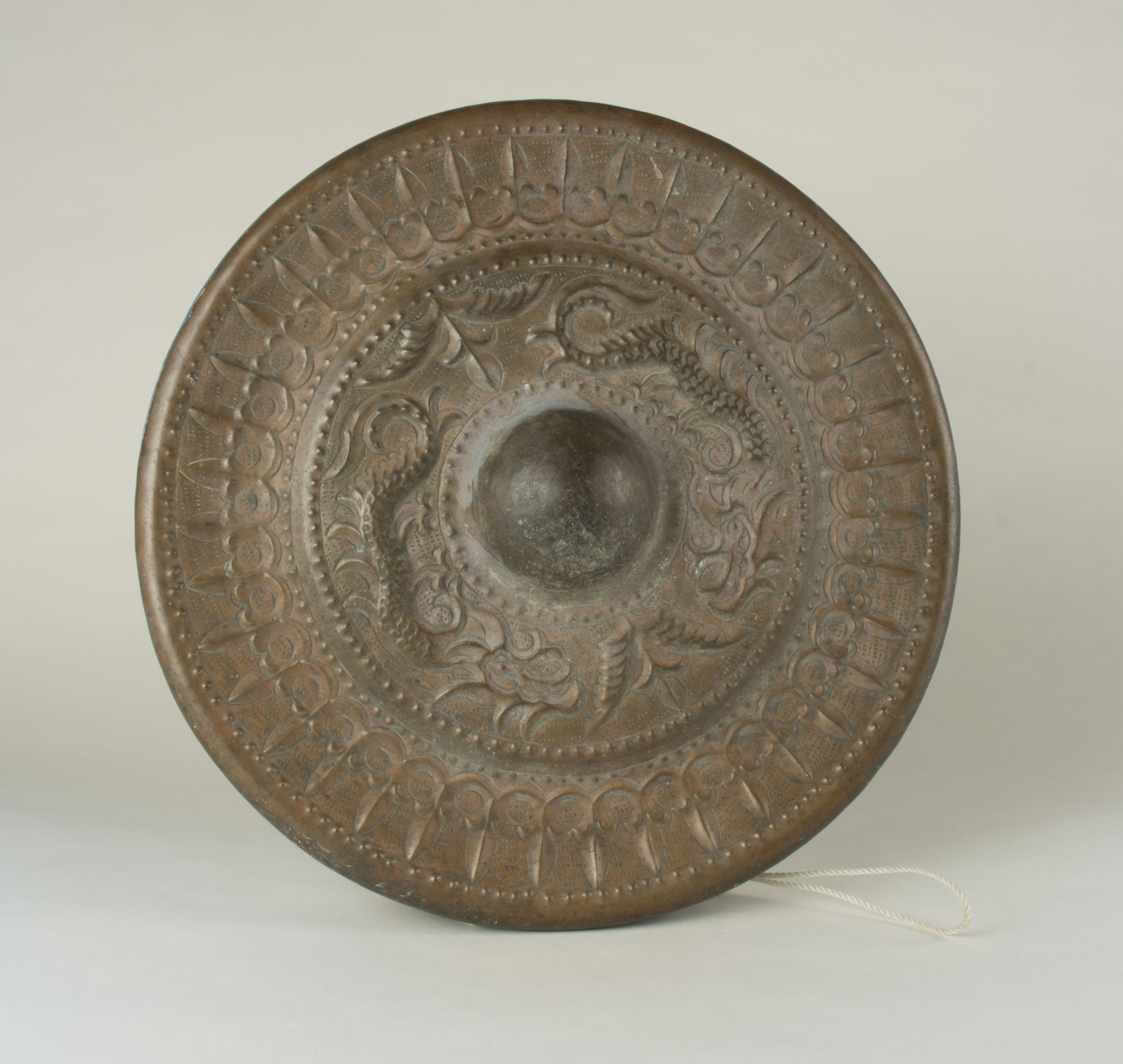 Gangsa bronze gong owned by Virginia B. Capulong- front view.Family heirloom from Abra, Northern Luzon. Any views, findings, conclusions, or recommendations expressed in this story do not necessarily represent those of the National Endowment for the Humanities. (c) Field Museum of Natural History - CC BY-NC 4.0