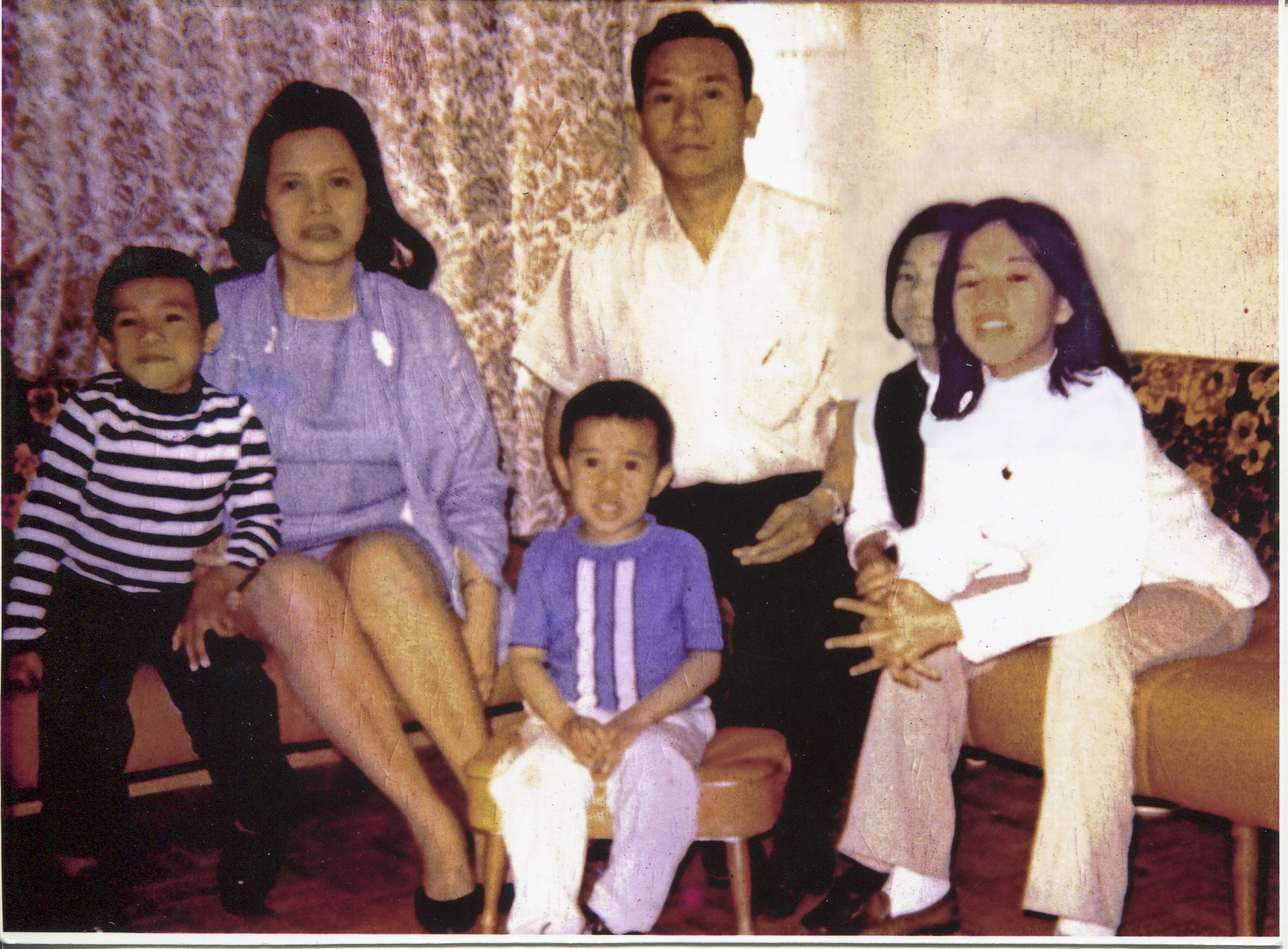 Photo of Arguelles and familyThis photo is a copy but the original was taken in 1970. Arguelles acquired it in 2011 from her mother’s collection of her father’s things (after his death). The photo was taken in Toronto, Canada. Left to right are pictured: Lester (brother), Magdalena (mother), Gene(brother), Jose (dad), Magdalena, Althea (sister). Arguelles said the photo may have been taken at a party because the people pictured all dressed up in “fineries” and food was served. Arguelles talked about her family’s early years of being immigrants in Canada. Thefamily was intact but her parents still struggled. Arguelles said the photo makes her think of her experiences and struggles in the early years in Canada. Arguelles also highlighted her sister, who wrote a poem about Canada that won an award. Her sister’s poem was readover the school intercom and used an Indian word for the title, which sticks out for Arguelles. She was proud of her sister. They all struggled though they were different. Arguelles said she knows it was hard on her parents. Any views, findings, conclusions, or recommendations expressed in this story do not necessarily represent those of the National Endowment for the Humanities. (c) Field Museum of Natural History - CC BY-NC 4.0