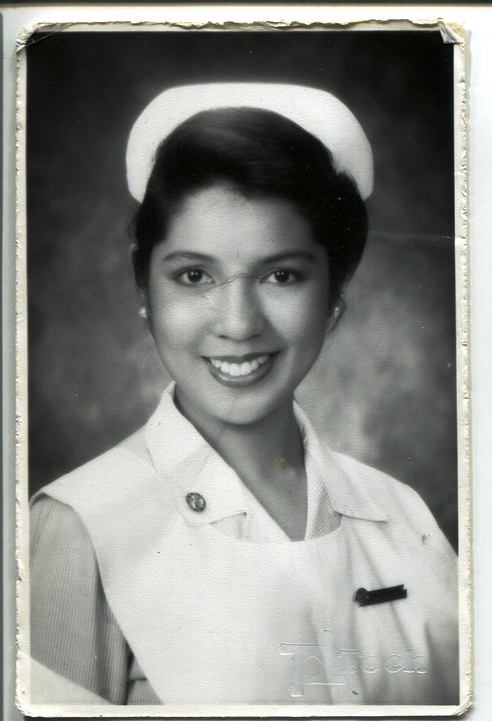 Photo of Ira Escarilla- Carnate. Taken at the end of the school year around March 1994 by a professional photographer (TOCH Photography) in Manila. This photo was required for the yearbook. Escarilla-Carnate is pictured graduating from nursing school, wearing white nursingcap. This photo belonged to Escarilla-Carnate’s mother.This is important because Escarilla-Carnate wanted to be a nurse and go to UP Manila (Phil General Hospital.) She added that it was tough to get into UP and finished it on time because only 50 students were accepted for the 1991 school year in the whole country. She is theonly one from Iloilo who was accepted in her class. She remarked that her mother encouraged her to finish nursing school in Manila but her parents didn’t like her being alone there. Escarilla-Carnate remarked that it made her more independent and resilient. Any views, findings, conclusions, or recommendations expressed in this story do not necessarily represent those of the National Endowment for the Humanities. (c) Field Museum of Natural History - CC BY-NC 4.0