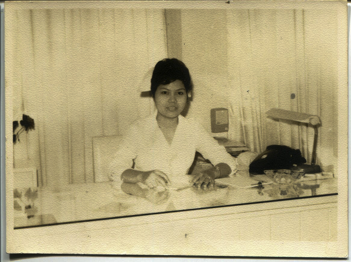 Photo of Tan, 1965. It is a picture of Tan, an office nurse at the Filipinas Hotel at Padre Faura. The back of the photo says “Please return to Necitas D. Tan class of 1963”. Tan said she was lucky to be hired as an office nurse at a hotel. Tan said there were lots of offices, with one usedby a nurse from Canada. It is from that nurse that Tan heard Canada was recruiting. Tan went to Canada in 1965 then moved back to the Philippines in 1968. Tan moved to Chicago in 1969. Any views, findings, conclusions, or recommendations expressed in this story do not necessarily represent those of the National Endowment for the Humanities. (c) Field Museum of Natural History - CC BY-NC 4.0