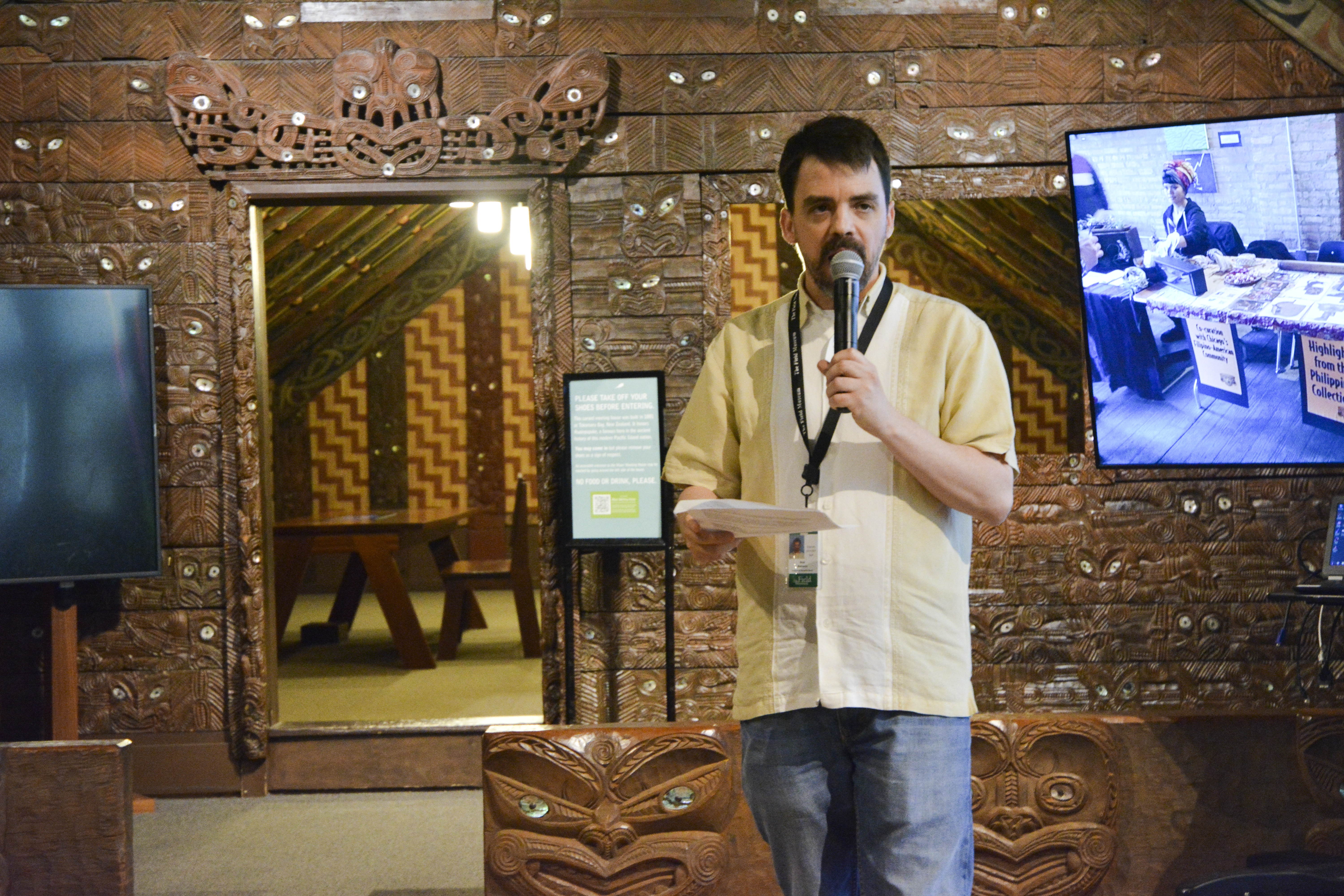 Neal Matherne presenting thank you certificates to volunteers, co-curators, and community partners. (c) Field Museum of Natural History - CC BY-NC 4.0