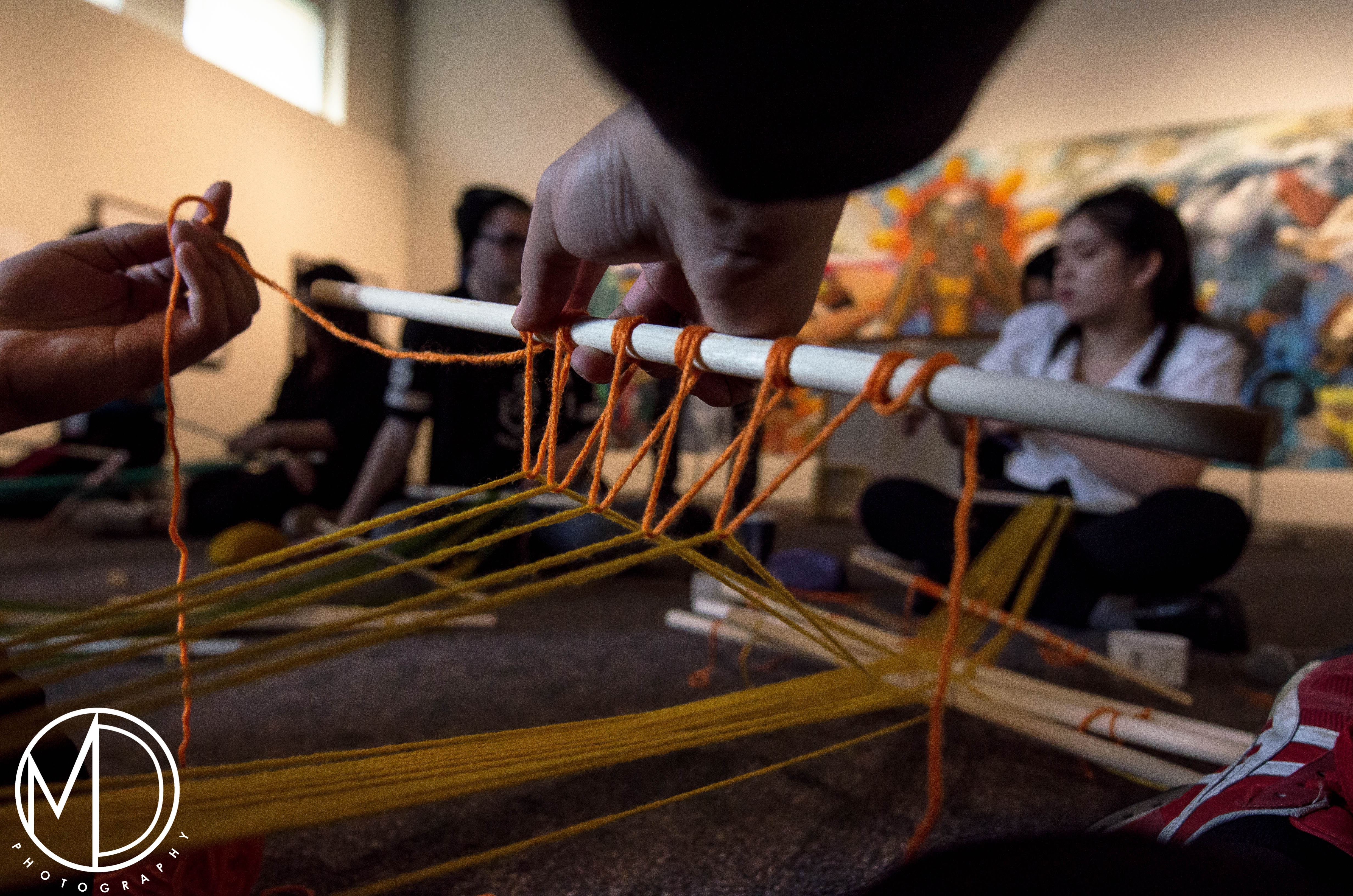 Weaving activity. (c) Field Museum of Natural History - CC BY-NC 4.0