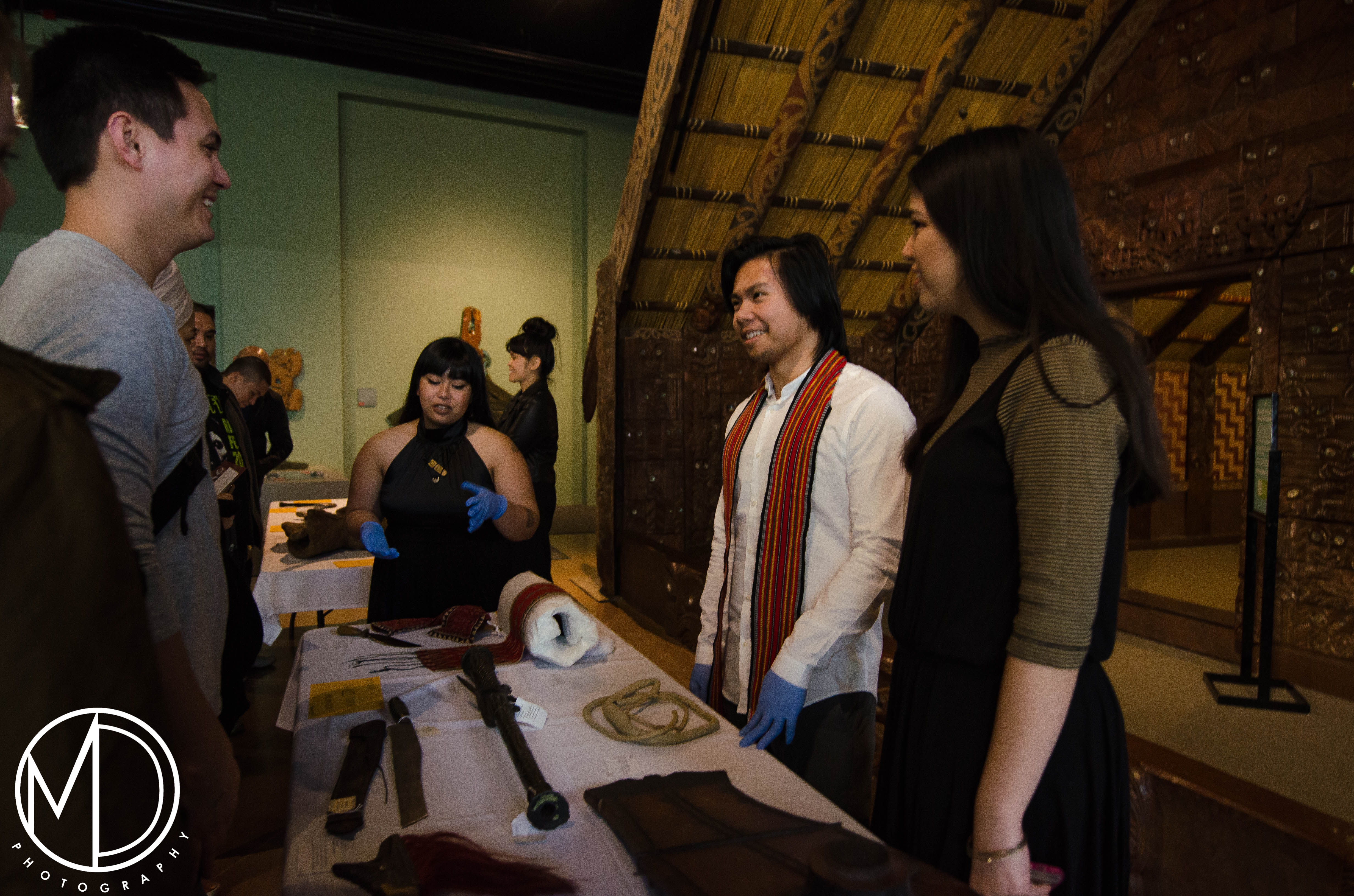 Avigail Bautista, Tristan Espinoza, and Loren Ibach watch over the object table. (c) Field Museum of Natural History - CC BY-NC 4.0