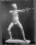 Bushman man from Family group. 3/4 view of life-size full length figure. Hunter with a bow and arrow. Plaster model by Malvina Hoffman.