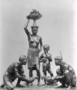 Woman from Bali, Boy from Java, Man from Madura, Man from Borneo. Front Group watching cockfight . Malvina Hoffman Bronze Sculpture