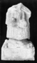 121523: Carving of priest fragmentary