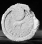 Inscribed circular fragment ceramic. Stamped Roman brick with outline of a dog (verify). 26768: Inscribed circular fragment