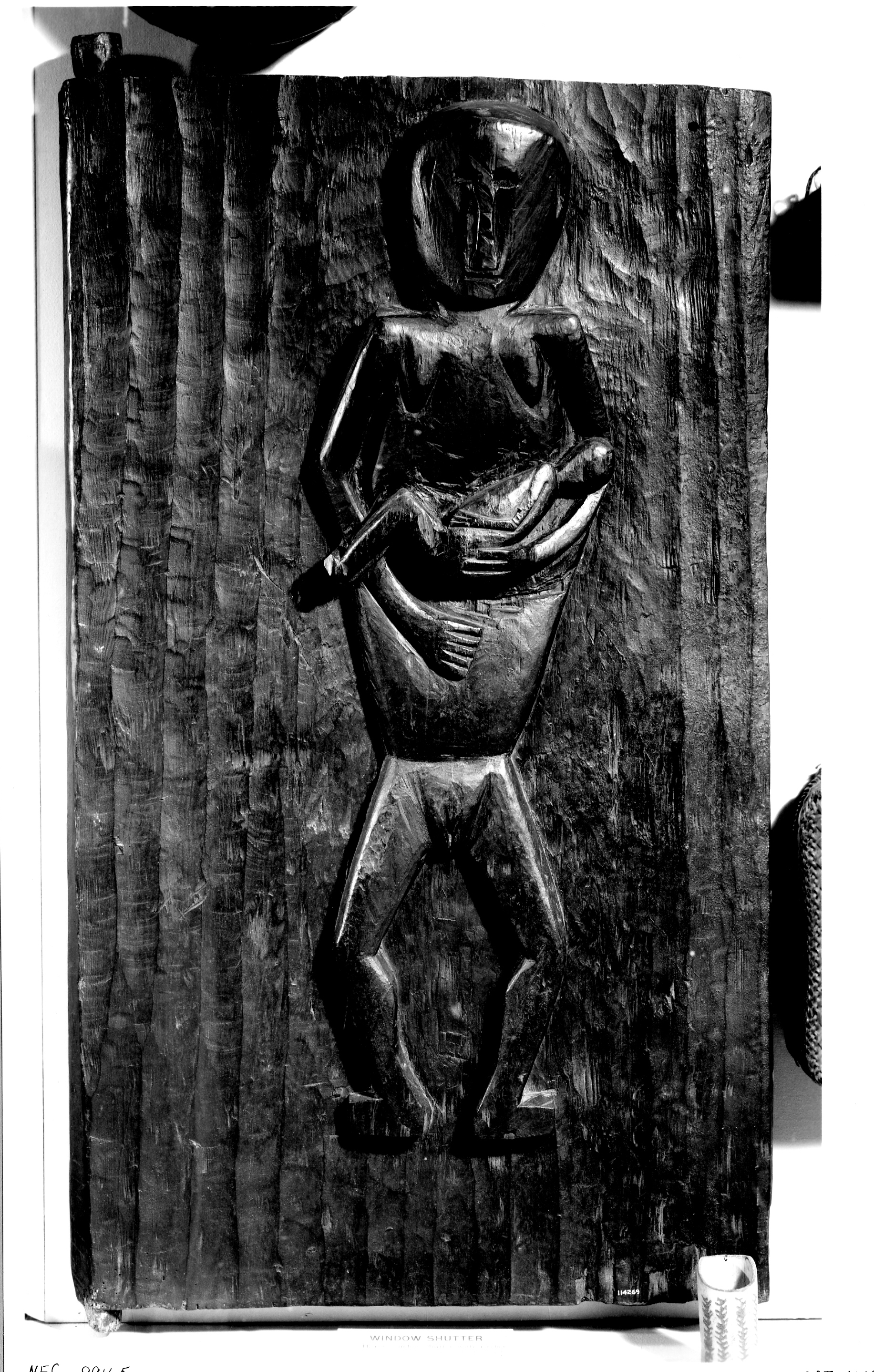 Carved wooden window shutter or blind  