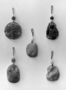 126611: brown amber girdle pendants