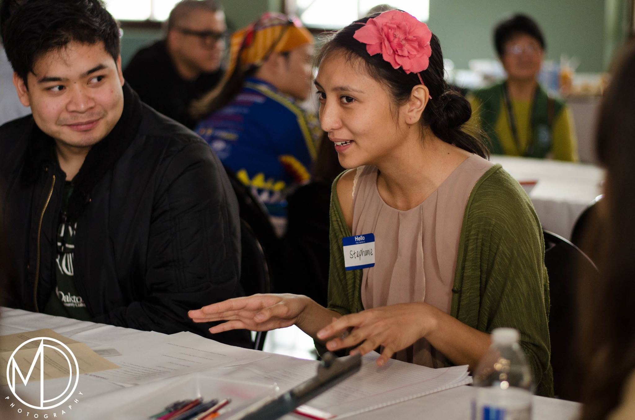 Volunteer participating in small group discussion. 