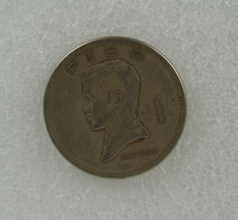 1 Peso coin owned by Loribelle Lorenzo. Shows Jose Rizal, with the coat of arms of the Philippines on the back. Words in Tagalog: “Republika ng Pilipinas, Bangko Sentral”. Any views, findings, conclusions, or recommendations expressed in this story do not necessarily represent those of the National Endowment for the Humanities. 