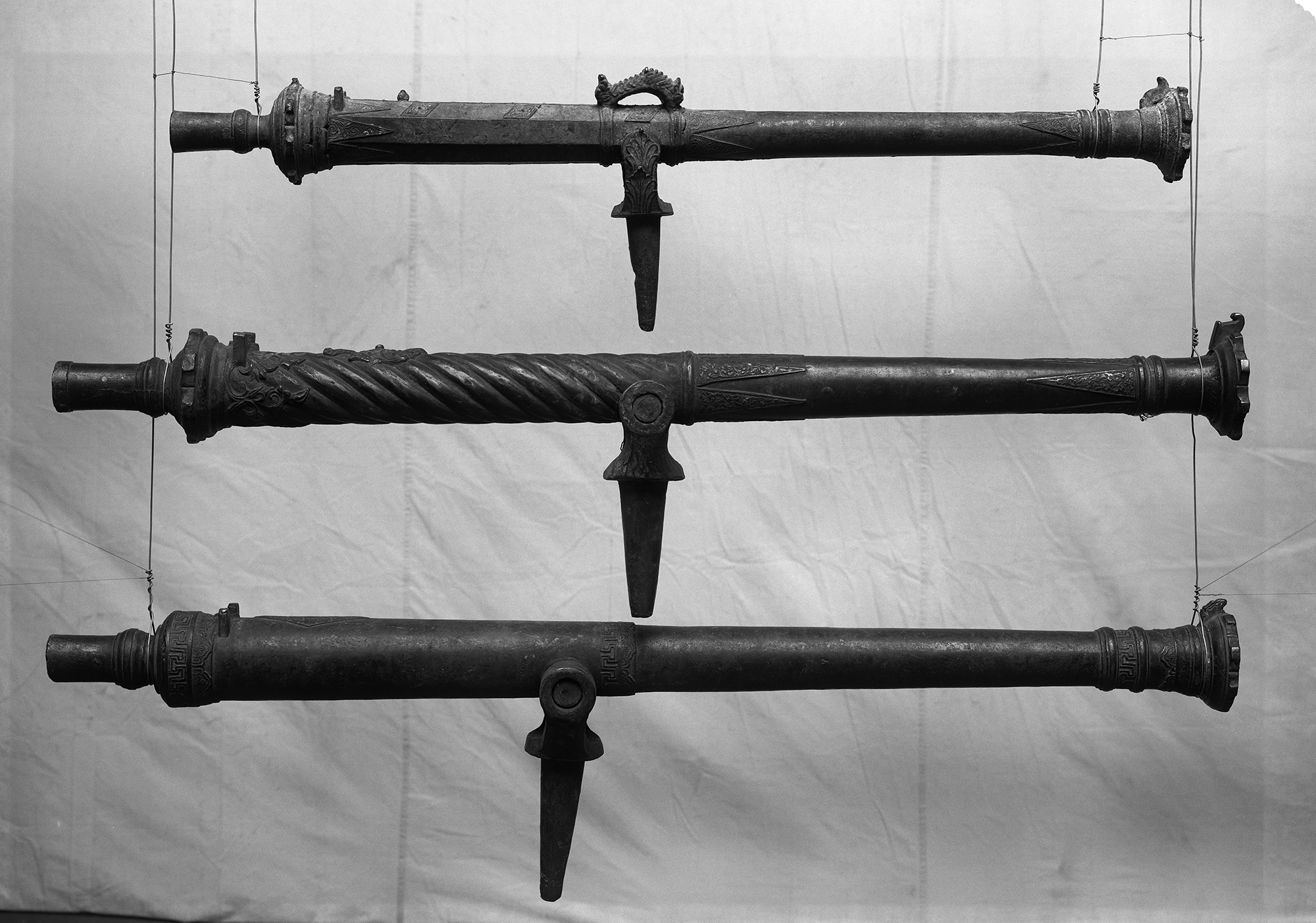 3 brass cannons, So-called Lantakea, captured from Moro. Studio setting. Field Columbian Museum.  